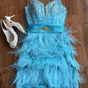 Spaghetti strap light blue feathered prom dress